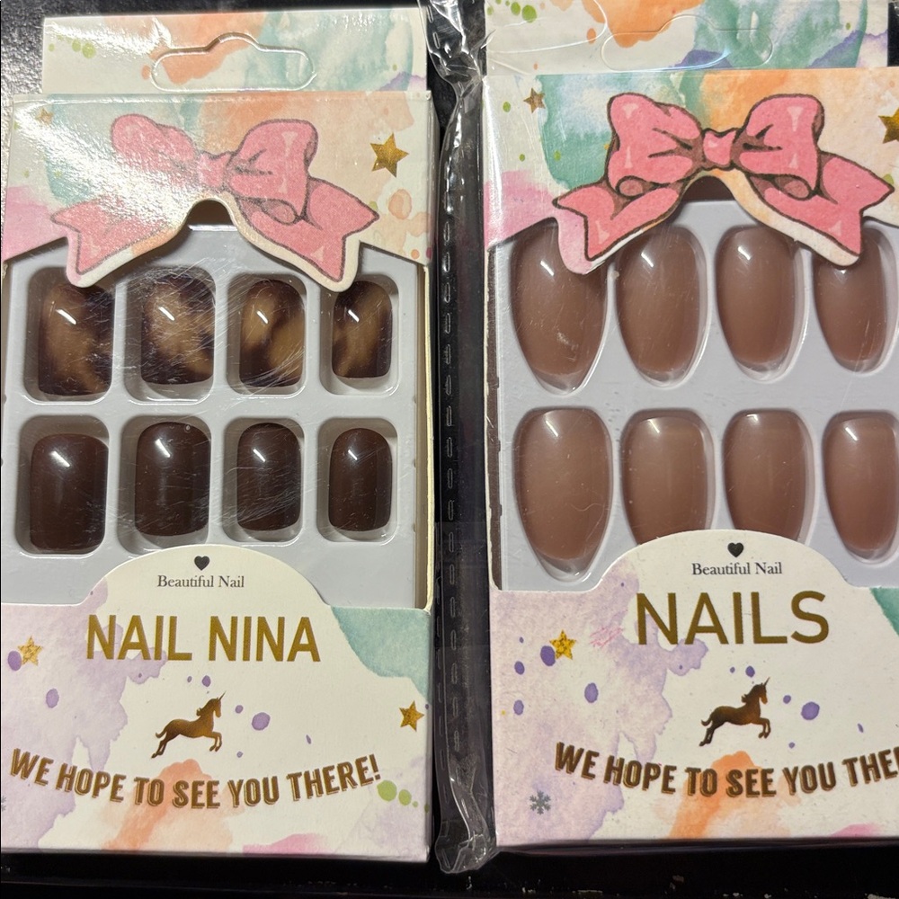 Two (2) Sets of Press on Nails Medium length